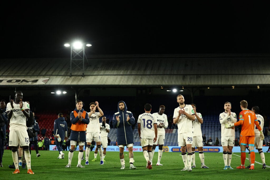 West Ham players applaud fans after drawing with Crystal Palace.