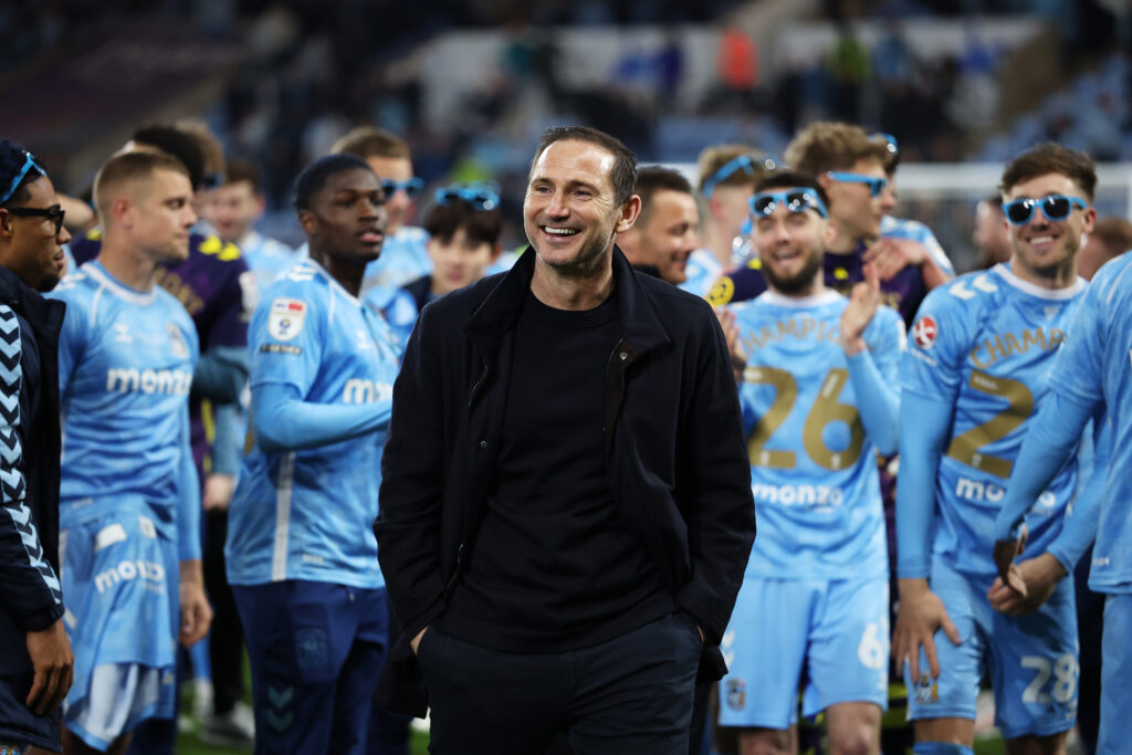 Frank Lampard, Manager of Coventry City, celebrates becoming champions with his players after the Sky Bet Championship match between Coventry City and Portsmouth