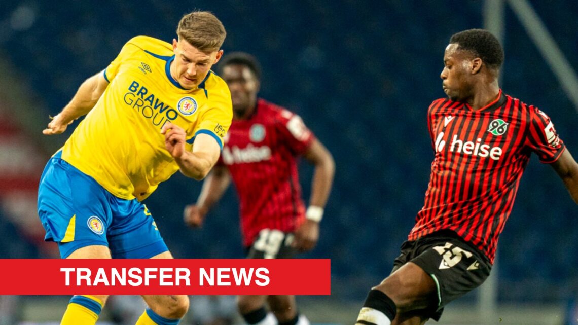 Image showing Florian Flick of Eintracht Braunschweig challenged by Noel Aseko of Hannover 96