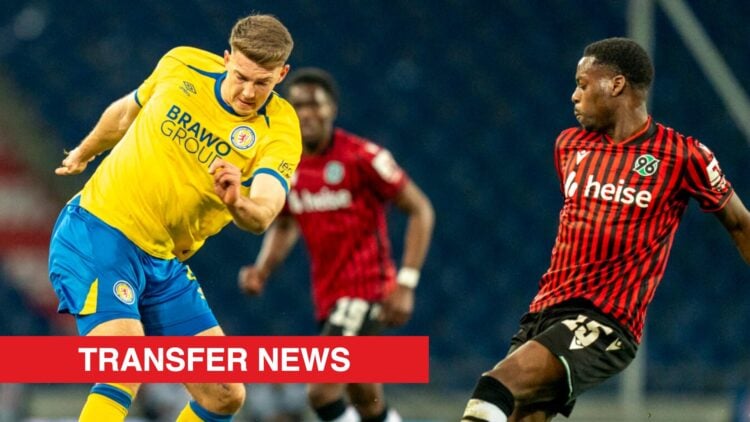 Image showing Florian Flick of Eintracht Braunschweig challenged by Noel Aseko of Hannover 96