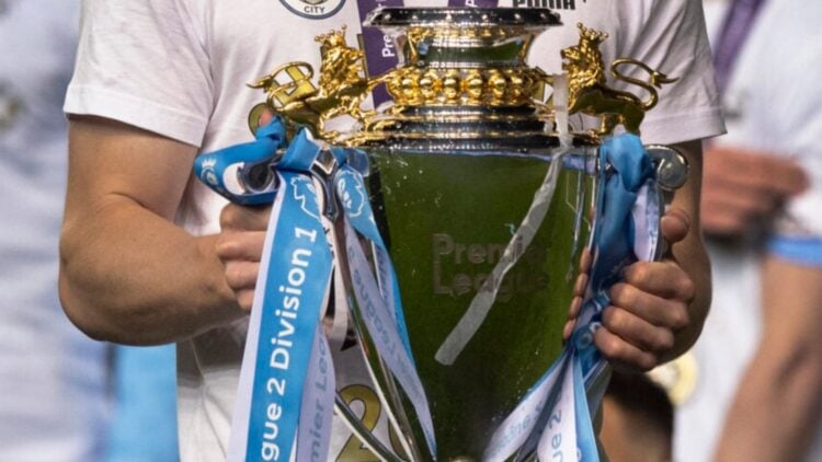 Image showing Liam Delap of Manchester City with the Premier League 2 trophy