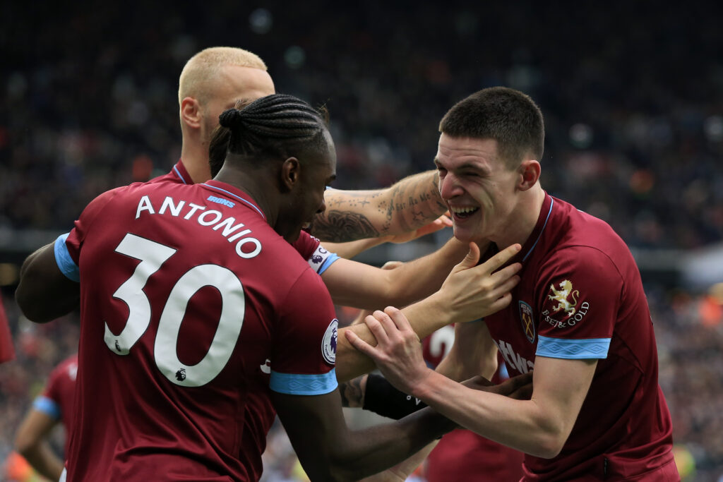 Declan Rice celebrates with Michail Antonio and Marko Arnautovic during West Ham United v Arsenal FC - Premier League