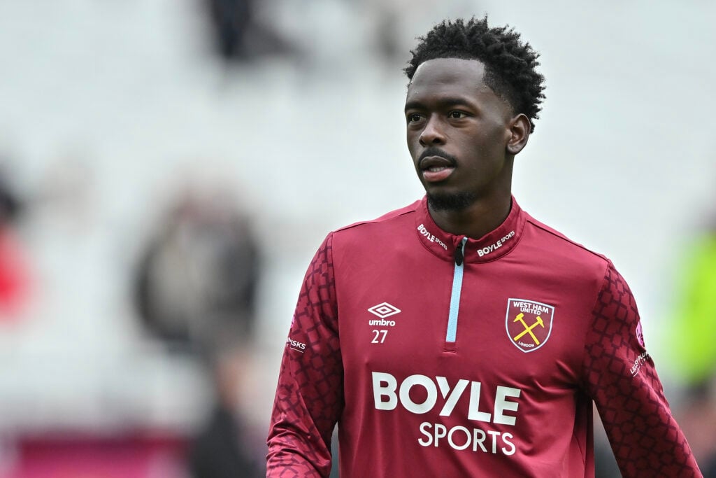 Soungoutou Magassa of West Ham United warms up before during the Premier League match between West Ham United and Arsenal at London Stadium