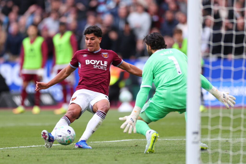 David Raya of Arsenal saves from Mateus Fernandes of West Ham United