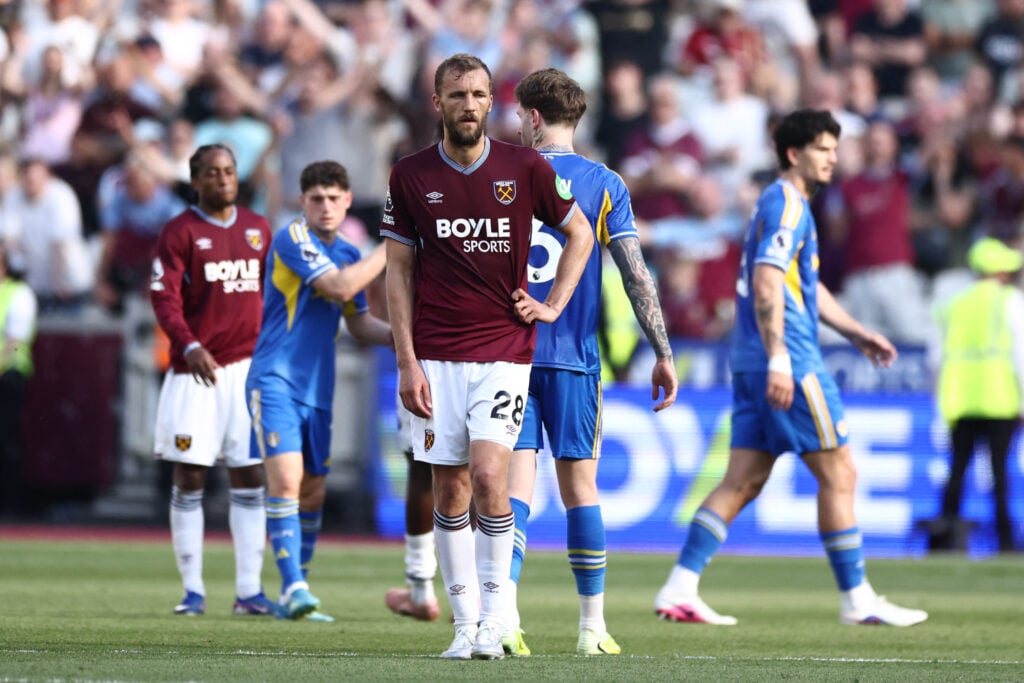 West Ham United's Czech midfielder #28 Tomas Soucek (C) reacts on the pitch after the English Premier League football match between West Ham United and Leeds United at the London Stadium, in east London on May 24, 2026. West Ham won the game 3-0 but were relegated