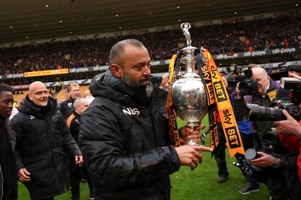 Nuno Espirito Santo celebrates winning the Championship with Wolves.