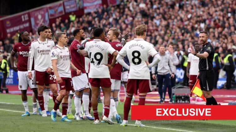 Assistant Referee, Dan Cook gestures towards players as they react to the VAR review concerning a foul on David Raya of Arsenal (not pictured) by P...