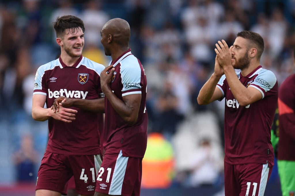 West Ham United's English midfielder Declan Rice, West Ham United's Italian defender Angelo Ogbonna and West Ham United's Coatian midfielder Nikola Vlasic