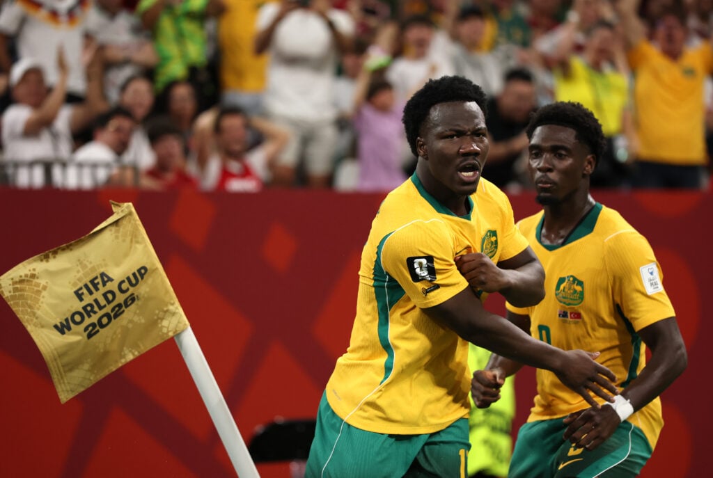 Nestory Irankunda of Australia celebrates becoming the country's youngest World Cup goalscorer