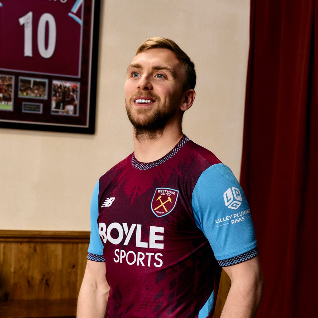 West Ham captain Jarrod Bowen models the club's new New Balance home shirt.